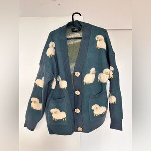 Warm soft cardigan with Sheeps embroidered